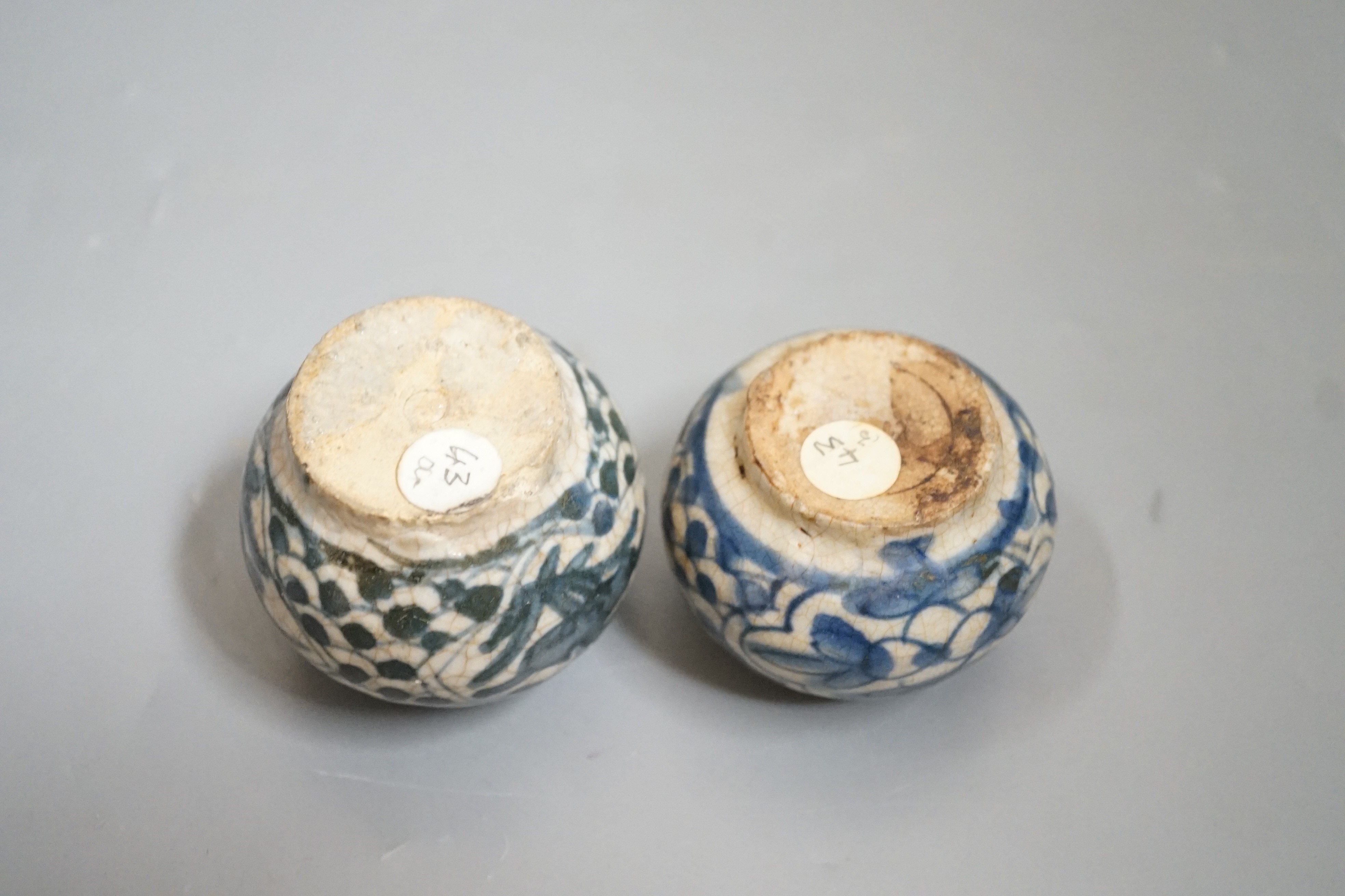 Two Chinese Swatow blue and white jarlets, early 17th century, 5cm tall